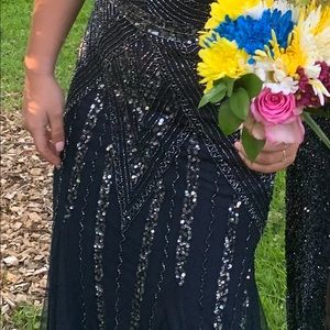 Brand new with tag navy blue and silver sequins prom dress. Size 7/8 juniors